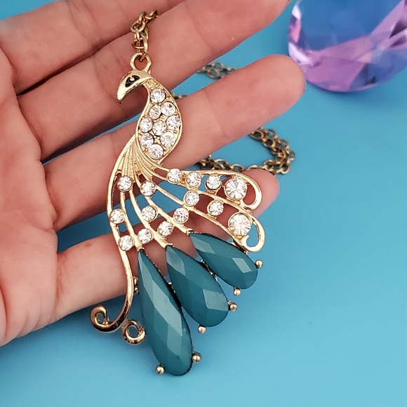 Gold tone peacock with faux teal gemstones and clear rhinestones necklace - Picture 2 of 5